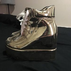 Gold high top wedge sneakers